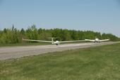 A new bird takes off in the Eastern Townships behind Juliette (the tow plane)